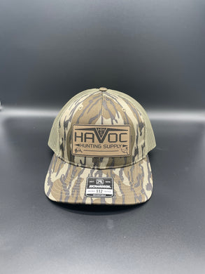 Havoc Hat- Leather Patch Mossy Oak Bottomland/Brown Netting