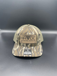 Havoc Hat- Leather Patch Mossy Oak Bottomland/Brown Netting